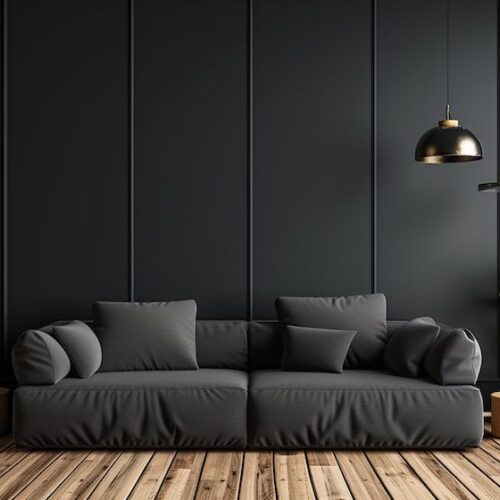 A minimalist black interior with a black sofa